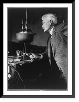 Prof. C.E. Munroe, three-quarter length portrait, facing left, standing in his laboratory, Historic Reproduction