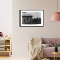 Returned refugee, who is building a house, with woman and child, outside the house, near Kemmel Hill, Belgium, Historic Print