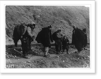 Refugees following the railroad tracks enroute to Gradeltza, Serbia, Vintage Print