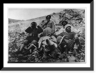 Theodore Roosevelt, Jr. seated, full-length portrait, with bighorn sheep, which he killed, and three native guides on 1926 hunting expedition, in Afghanistan or India, Vintage Print