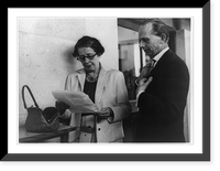 Hannah Arendt, half-length portrait, standing, facing left; looking at paper with reporter, Vintage Poster