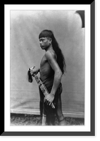 Historic Framed Print, [Dyak man, Singapore, standing, three-quarter length portrait, facing left],  17-7/8" x 21-7/8"