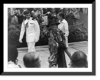 Mrs. Nicholas Longworth and Miss Joanna Sturm escorted by a White House Social Aide arriving at the East Gate of the White House for the wedding of Tricia Nixon and Edward Cox Classic Wall Art Pr
