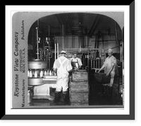 Historic Framed Print, Automatic machine for filling and capping bottles of milk,  17-7/8" x 21-7/8"