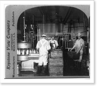 Historic Framed Print, Automatic machine for filling and capping bottles of milk,  17-7/8" x 21-7/8"