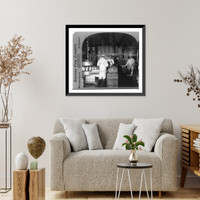 Historic Framed Print, Automatic machine for filling and capping bottles of milk,  17-7/8" x 21-7/8"