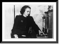 Historic Framed Print, [Margaret Truman, half-length portrait, seated, facing right, playing phonograph],  17-7/8" x 21-7/8"