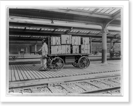 Union Station, Washington, D.C.: Electric baggage truck operated by baggage porter, Vintage Poster