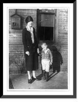Policewoman holding hand of boy, Washington, D.C, Historic Print