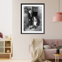 Policewoman holding hand of boy, Washington, D.C, Historic Print