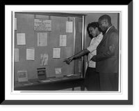 Historic Framed Print, [Two black students at National Youth Administration library exhibit],  17-7/8" x 21-7/8"