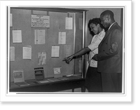 Historic Framed Print, [Two black students at National Youth Administration library exhibit],  17-7/8" x 21-7/8"