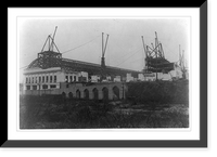 Historic Framed Print, [Union Station, Wash., D.C.: west end, showing erection of last steelwork in concourse roof],  17-7/8" x 21-7/8"