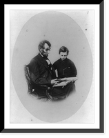 Abraham Lincoln, U.S. President, looking at a photo album with his son, Tad Lincoln, Feb. 9, 1864, Vintage Wall Art