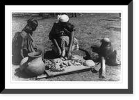 African woman cutting up vegetables as another watches, Kenya, Historic Print