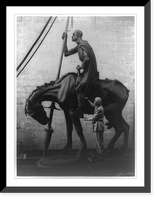 Anna Hyatt Huntington, sculptor, putting final touches on her equestrain statue of Don Quixote.Joli photographers, Antique Print