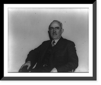 Morris L. Cooke, half-length portrait, seated, facing front, Antique Poster