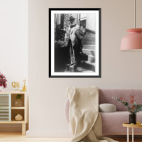 Historic Framed Print, [Alexander Graham Bell, full-length portrait, standing on steps facing left, holding overcoat],  17-7/8" x 21-7/8"