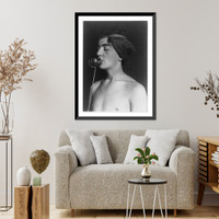 Boy in headband, shirtless, holding metal poppy" to nose, in studio", Antique Poster
