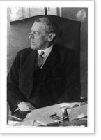 Woodrow Wilson, half-length portrait, seated at desk, facing left, at one of his first cabinet meetings, Antique Wall Art