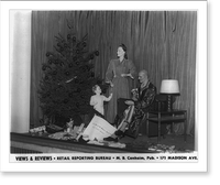 Views & reviews. Arnold Constable store window display with three mannequins with gifts and a Christmas tree, Historic Print