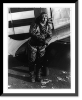 Lt. Orvil A. Anderson, full-length portrait, standing, facing front, in aviator's clothes, alongside plane Classic, Historic Print