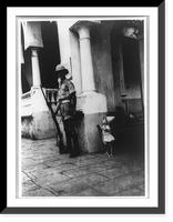 Small child looking up at British sentry in Di&eacute;go Suarez Harbour, Madagascar, during occupation, Vintage Poster