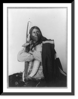 Distributor, Native American man, three-quarter length portrait, seated, facing right; arms folded, holding bow, arrow, and tomahawk; dressed in bone breast plate, Antique Wall Art