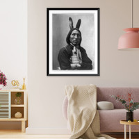 James Lone Elk, Dakota Indian, half-length portrait, facing left with arms folded; wearing bone breast plate and feathers in hair Classic, Antique Print