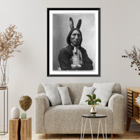James Lone Elk, Dakota Indian, half-length portrait, facing left with arms folded; wearing bone breast plate and feathers in hair Classic, Antique Print