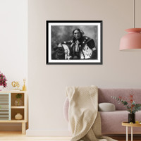 Historic Framed Print, [Eddie Plenty Holes, a Sioux Indian, half-length portrait, facing front, holding tomahawk],  17-7/8" x 21-7/8"
