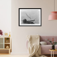 Man in small sailboat fishing for shellfish, Vintage Poster