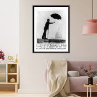Historic Framed Print, [Representative William D. Upshaw of Georgia, a leader of the drys, standing on railing with crutch and holding umbrella, with dome of the U.S. Capitol under the umbrella,  17-7/8" x 21-7/8"