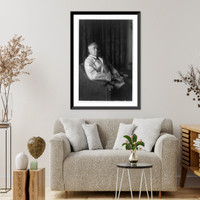 Maurice Maeterlinck, three-quarter-length portrait, seated facing right, with open book in hands, Vintage Wall Art