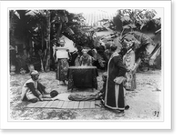 Elderly man watching two young boys holding another young boy down on a mat while standing man reads scroll Classic, Vintage Print