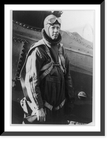Historic Framed Print, [Charles A. Lindbergh, three-quarter length portrait, standing, facing right, in aviator's clothing, alongside airplane after flight from Miami],  17-7/8" x 21-7/8"