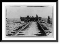 Historic Framed Print, [Automobile straddling railroad tracks during race between New York and San Francisco],  17-7/8" x 21-7/8"