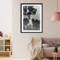 Frank White, full-length portrait, swinging golf club, right profile, Antique Poster