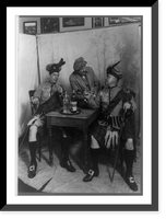 Two men wearing kilts seated at small table, drinking Sandy MacDonald scotch, with man standing and leaning against the table, Antique Wall Art