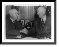 President Truman, left, shaking hands with Dwight D. Eisenhower while seated at table in the White House.United Press Photo. Classic, Historic Reproduction