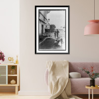 Historic Framed Print, [Soldier on street with six native children in foreground in the Philippines],  17-7/8" x 21-7/8"