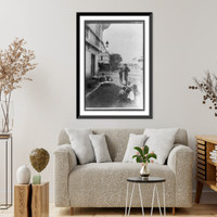 Historic Framed Print, [Soldier on street with six native children in foreground in the Philippines],  17-7/8" x 21-7/8"