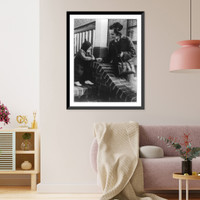 Historic Framed Print, [Nurse from New York City's Henry Street Visiting Nurse Service getting acquainted with one of her young patients as he sits on the porch of his home in a New York suburb],  17-7/8" x 21-7/8"