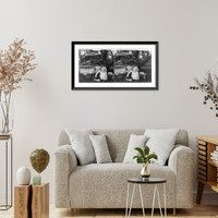 Man with arm around woman on bench and chaperone sleeping in hammock Classic, Antique Poster