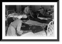 Nurse preparing arm of prisoner, possibly for blood donation to aid the armed forces during World War II, San Quentin prison, California, Vintage Wall Art