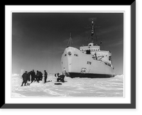 A group of the Coast Guardsmen building an igloo on the ie a short distance from the bow of the icebreaker Eastwind, Antique Print