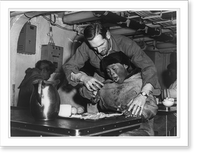 Frederick C. Langille, USCG, of Everett, Mass., helping an Eskimo to eat with a fork aboard the icebreaker Eastwind on a Coast Guard hydrographic mission on Baffin Island Timeless Wall Art Print