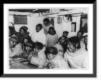 Eskimos watching movie aboard icebreaker Eastwind on Coast Guard hydrographic mission on Baffin Island, Vintage Print