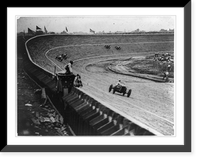 Automobile racing on curved wood track, probably in or near Washington, D.C., with flag man in foreground, Antique Print