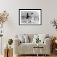 Man assisting woman into boat, Oyster Bay, Long Island, N.Y, Antique Wall Art